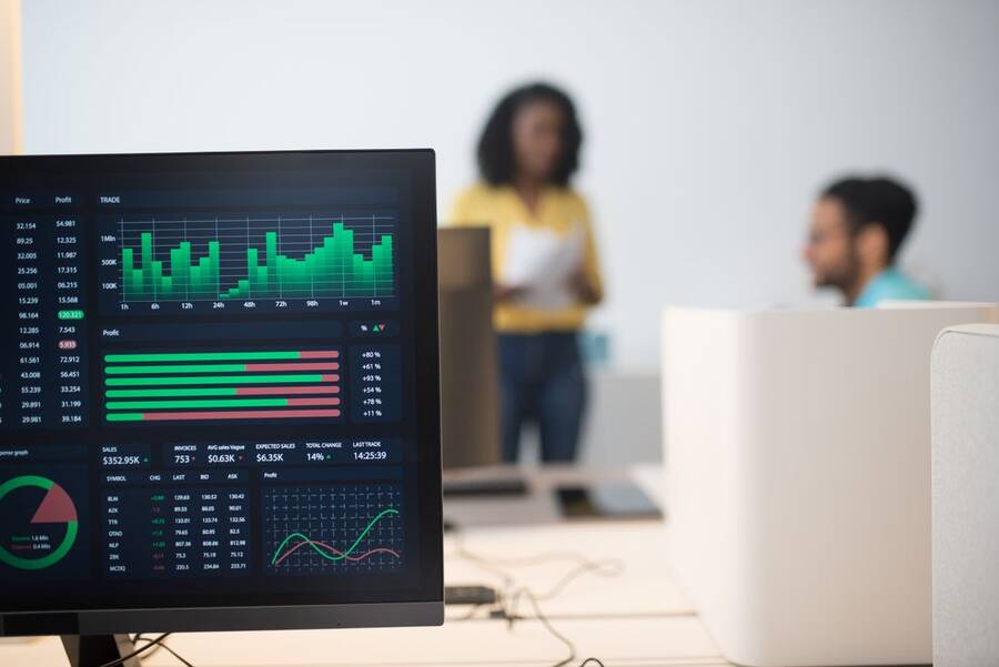 African consultants reviewing digital marketing and automation dashboards